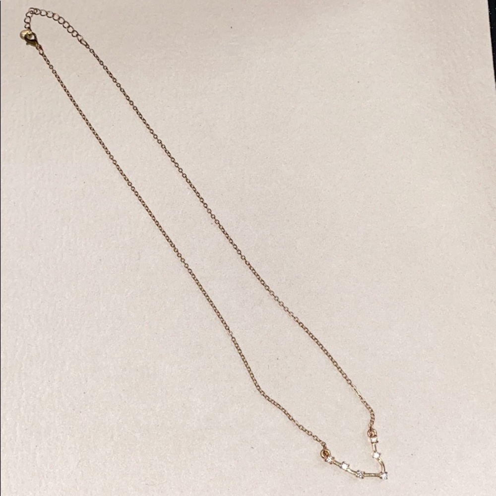 Gold diamond Pisces star sign necklace